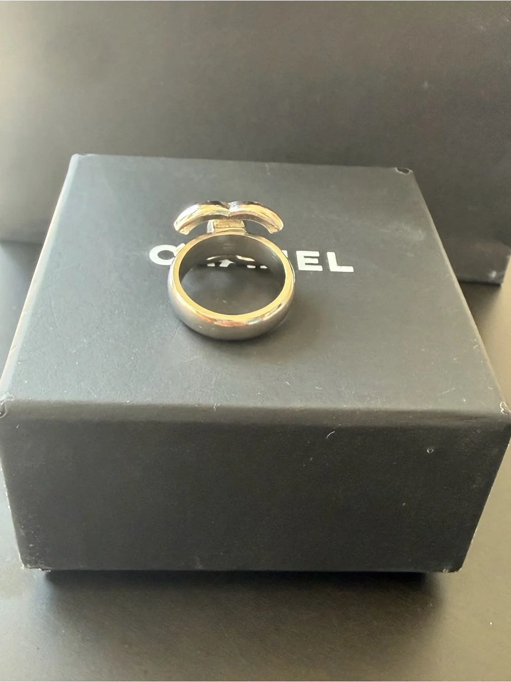 CHANEL ring showcasing